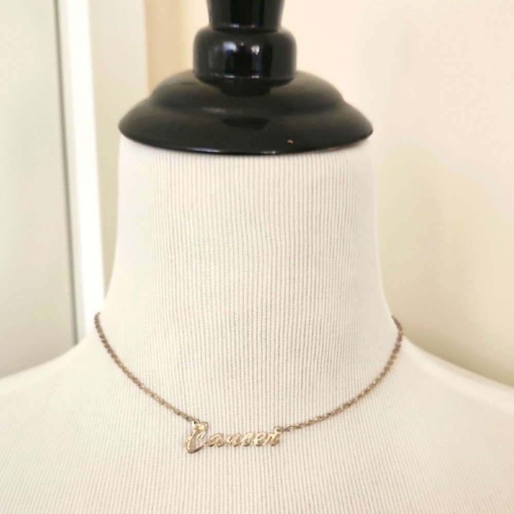 Claire's Silver zodiac "Cancer" necklace. One size.